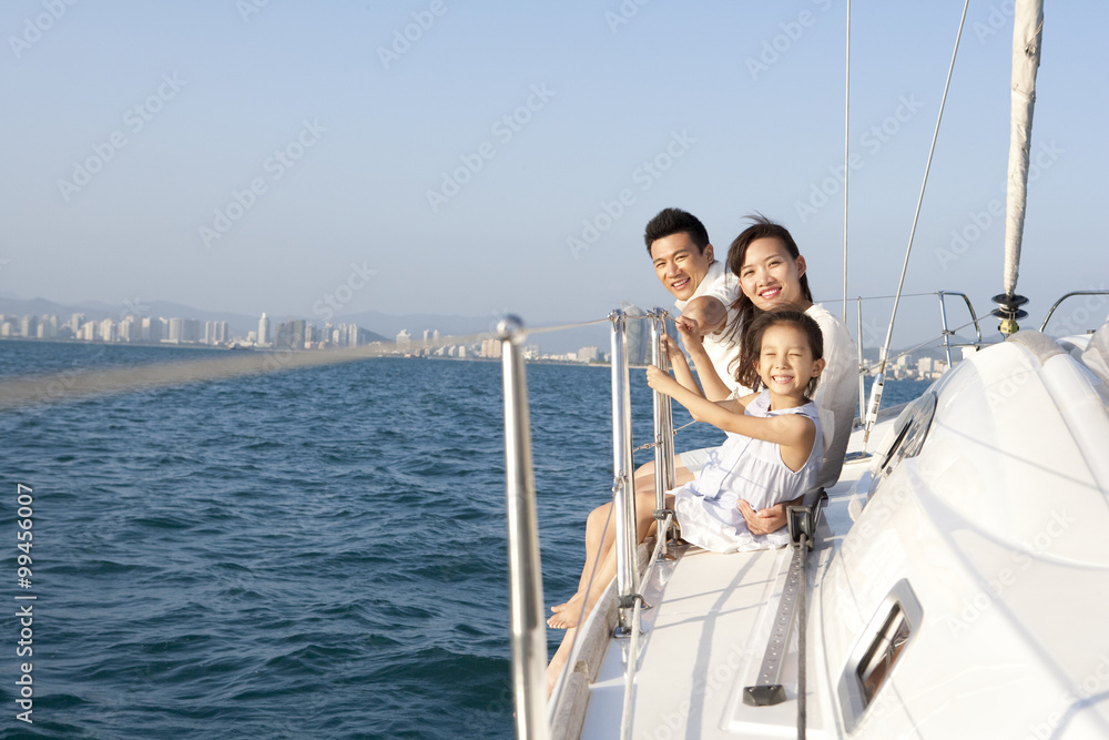 Happy family sitting on the deck Happy family sitting on the deck