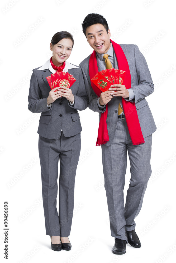Happy business colleagues gifting traditional red envelopes