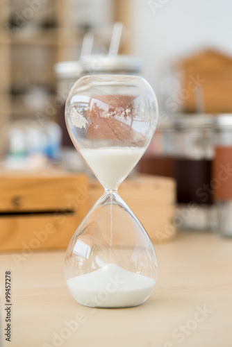 Hourglass on table