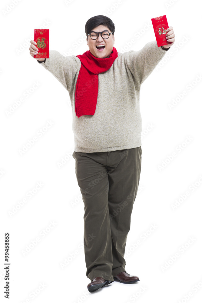 Chubby young man with red packets celebrating Chinese New Year Chubby young man with red packets celebrating Chinese New Year