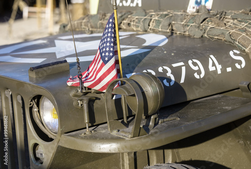 Принти на полотні American flag on the hood of a car WWII / closeup of an American military jeep w