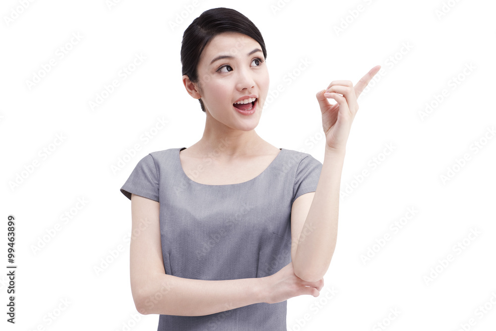 Young businesswoman pointing aside Young businesswoman pointing aside