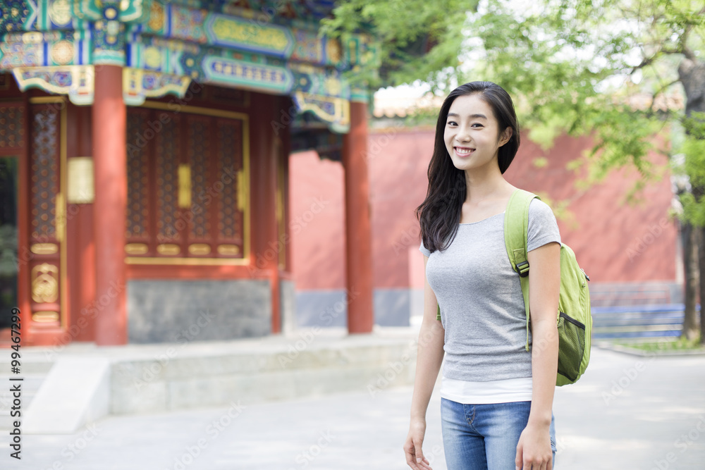 Young woman travelling at the Lama Temple