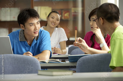 Students Talking In A Classroom photo