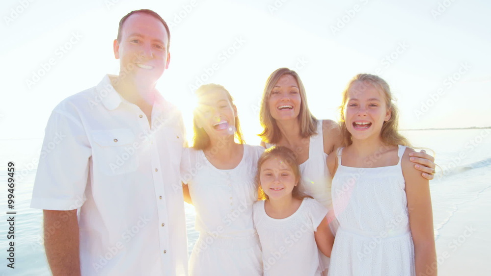 Portrait of a young Caucasian family on a beach Portrait of a young Caucasian family on a beach