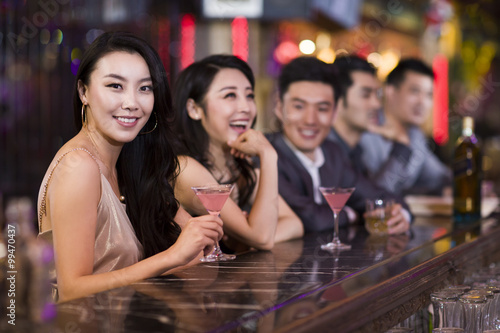 Young woman in bar