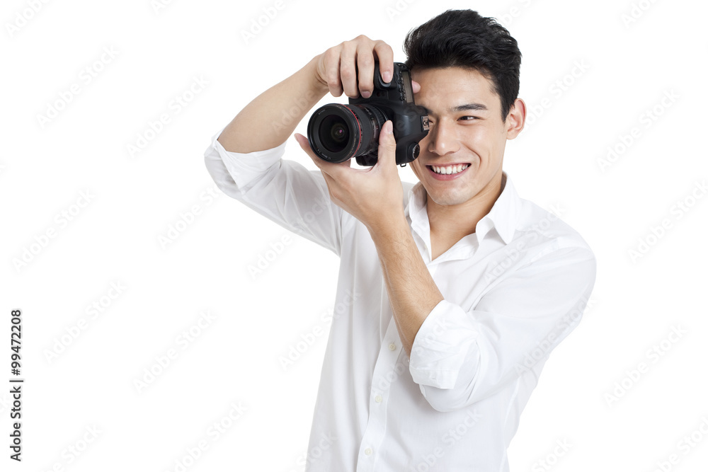 Young man taking photos