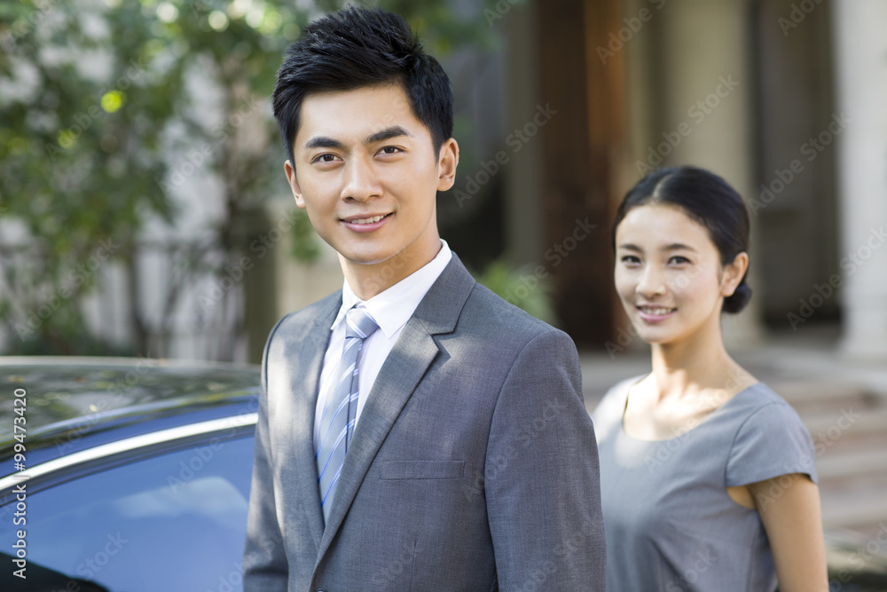 Young couple and car