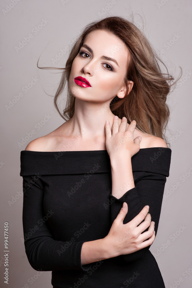 Fototapeta premium Portrait of beautiful blonde woman with curly hairstyle and bright makeup, perfect skin, skincare, spa, cosmetology. Sexy vogue woman face, sensual beauty girl model. Natural look. studio, isolated.