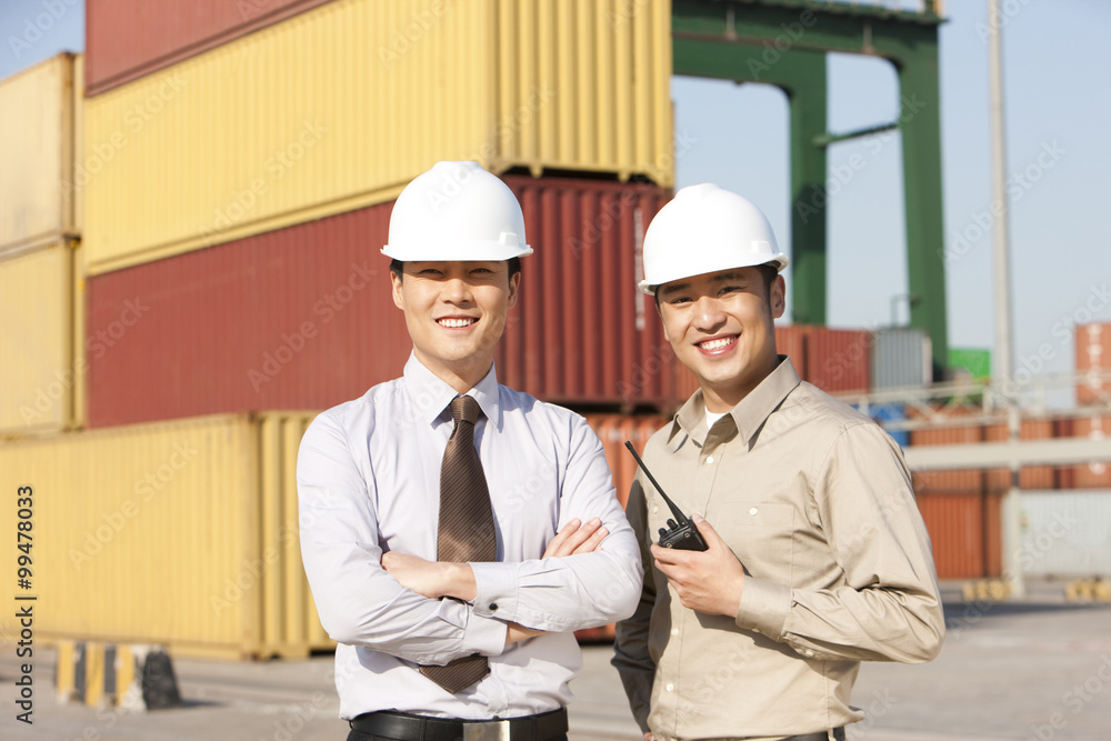businessman with shipping industry worker businessman with shipping industry worker
