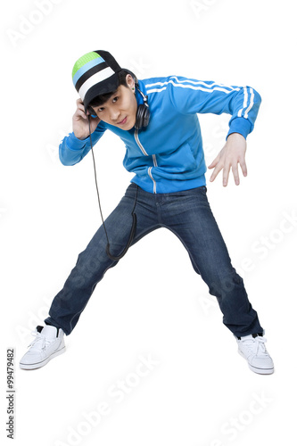 Portrait of a hip man listening to headphones