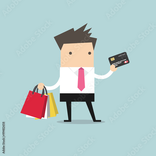 businessman with credit card and shopping bags