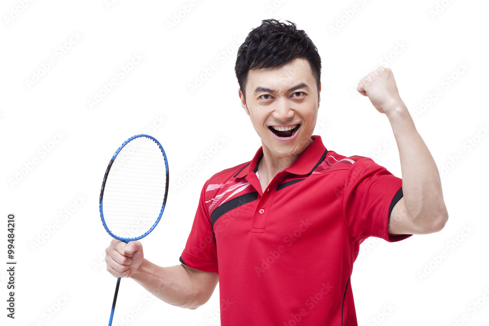 Male badminton player celebrating with excitement Male badminton player celebrating with excitement