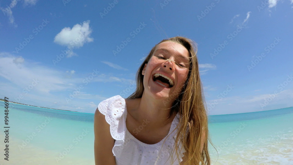 Selfie portrait of female Caucasian teenager with a starfish Selfie portrait of female Caucasian teenager with a starfish