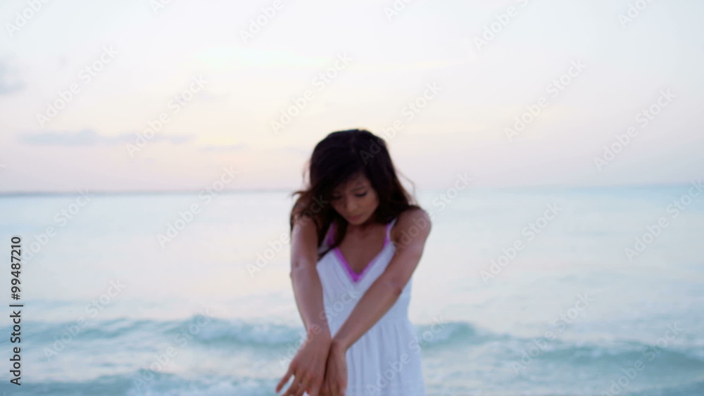 Ethnic Asian Chinese girl on ocean beach Bahamas Ethnic Asian Chinese girl on ocean beach Bahamas