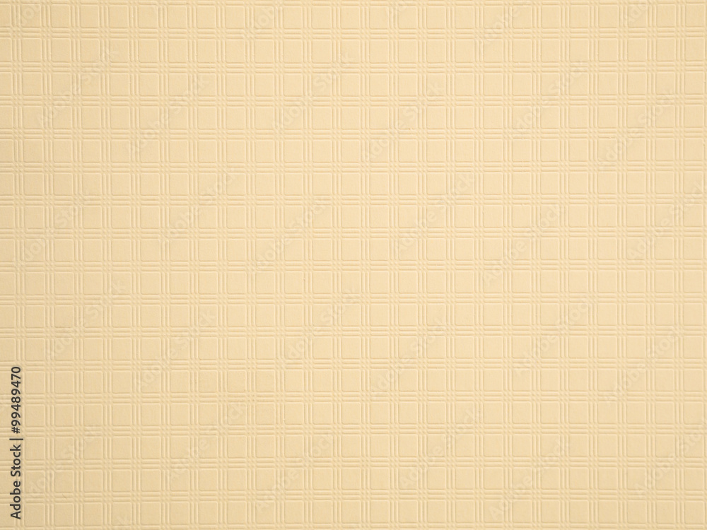 The paper square texture with cream color be a background The paper square texture with cream color be a background
