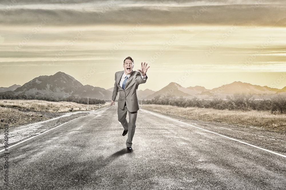 Man running and reaching hand