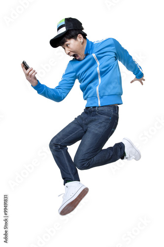 excited man jumping up with phone