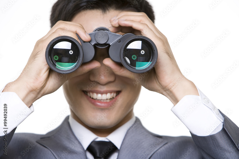 Businessman Looking Through Binoculars Businessman Looking Through Binoculars