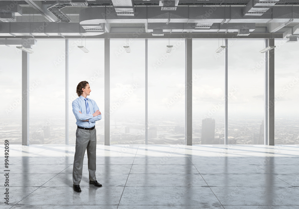 Businessman in modern interior Businessman in modern interior
