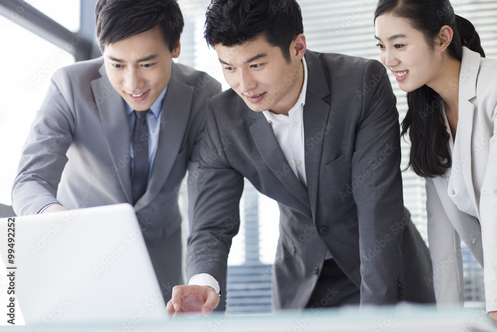 Young business person talking in meeting room Young business person talking in meeting room