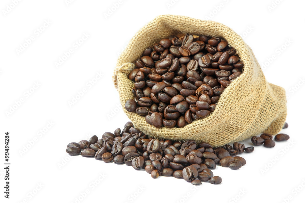Roasted coffee beans in burlap sack on white background. Roasted coffee beans in burlap sack on white background.