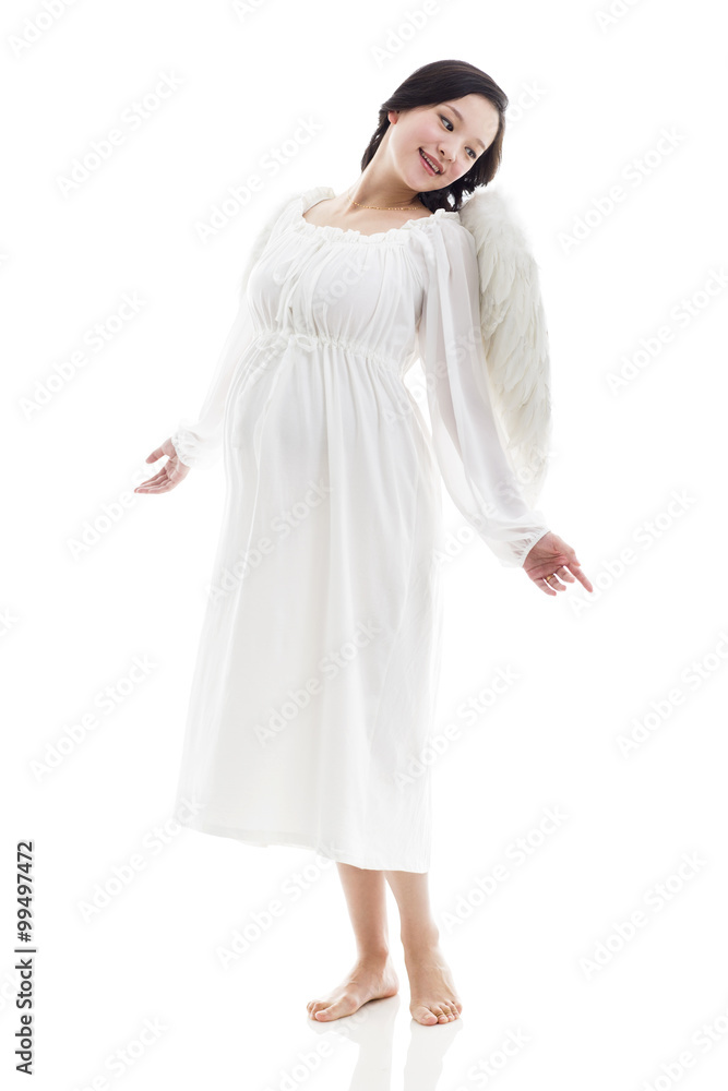 Pregnant woman wearing angel wings Pregnant woman wearing angel wings