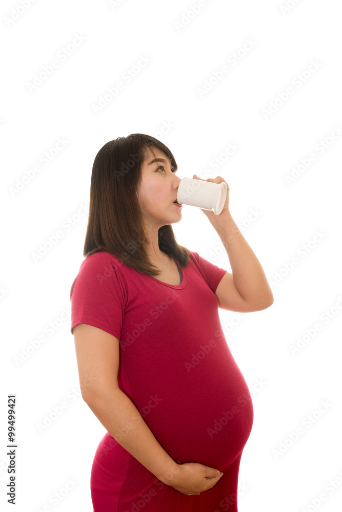 Portrait of pregnant woman with milk in glass isolated on white Portrait of pregnant woman with milk in glass isolated on white