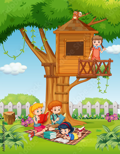 Children reading books in the park