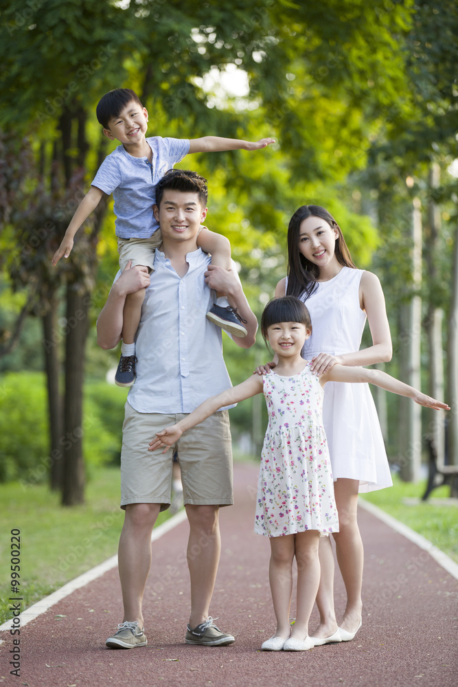 Fototapeta premium Portrait of happy young family