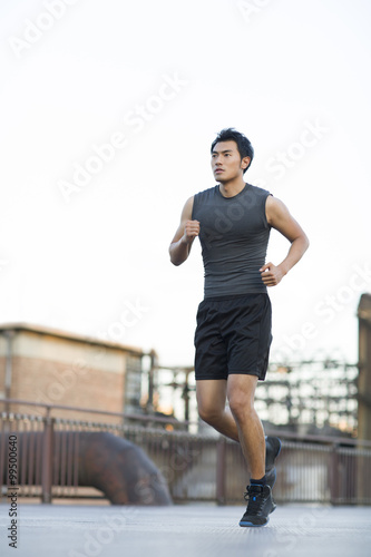 Young jogger running outdoors