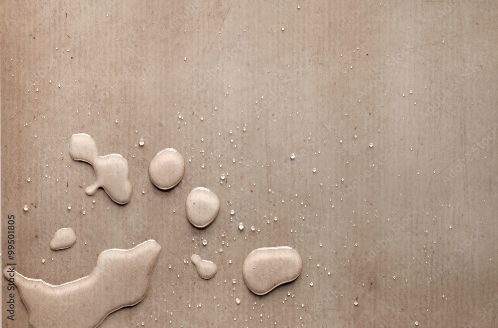 splash drops on carton piece of paper
splash drops on carton piece of paper