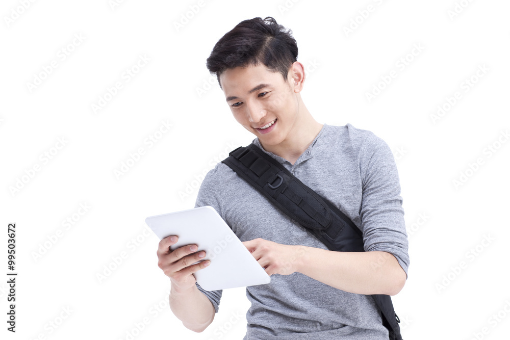 Happy male college student with digital tablet Happy male college student with digital tablet