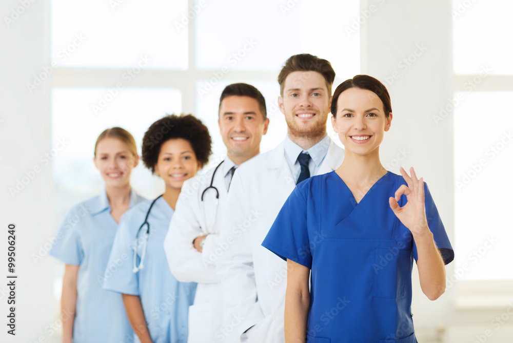 group of happy doctors at hospital group of happy doctors at hospital