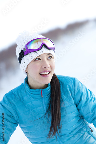 Young woman in skiing resort