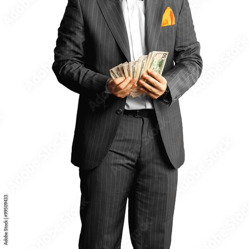 man in suit counts the money