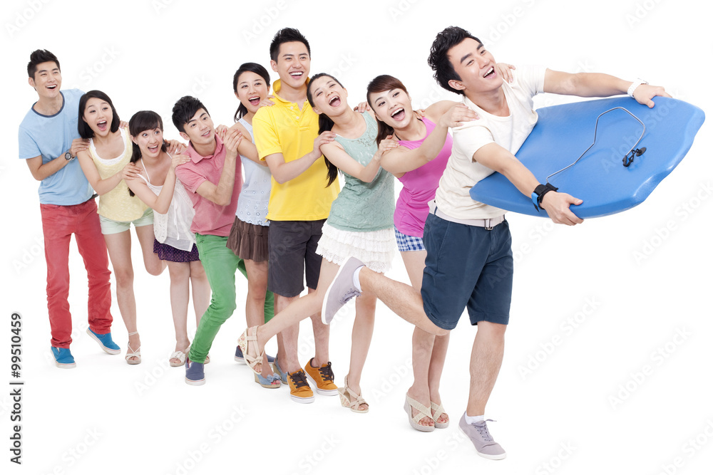 Fototapeta premium Young people imitating surfing in a row