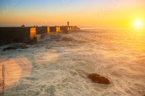 Stunning sunset on the coast, while the surf.