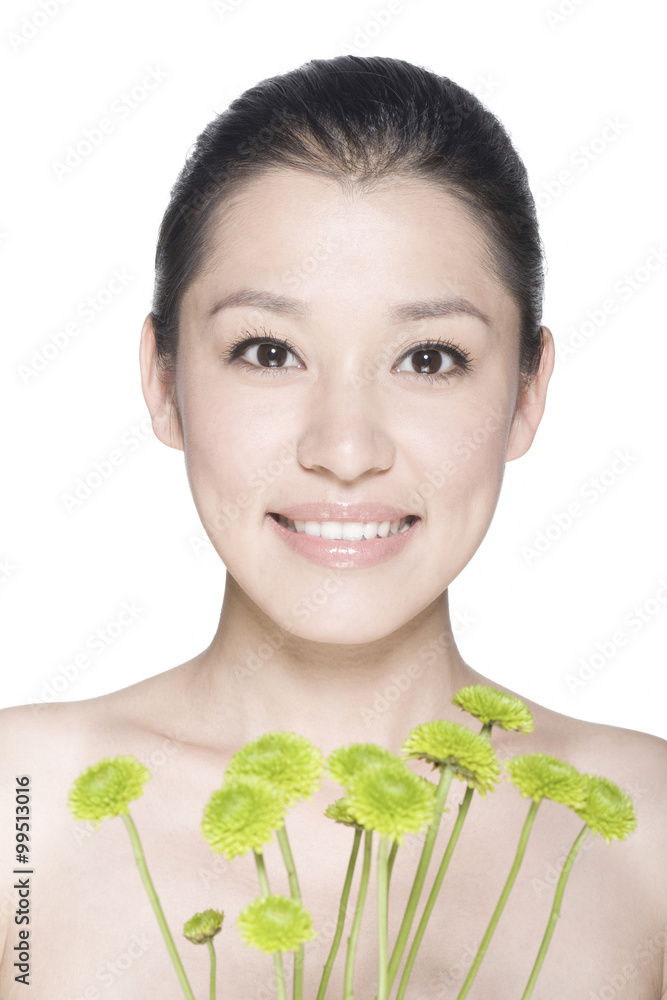 Beauty shot of a young woman with Chrysanthemums Beauty shot of a young woman with Chrysanthemums
