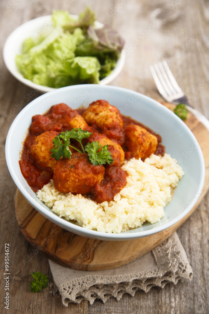 Chicken meatballs with tikka sauce and couscous Chicken meatballs with tikka sauce and couscous