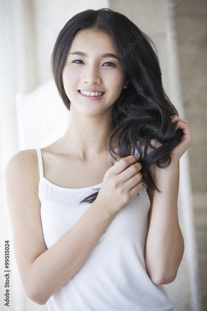 Fototapeta premium Young woman with long hair