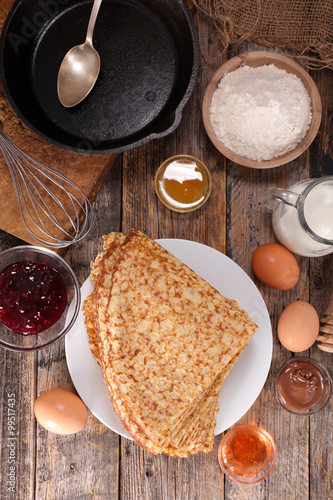 crepe with ingredient on wood background