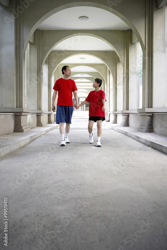 Couple Holding Hands © Blue Jean Images