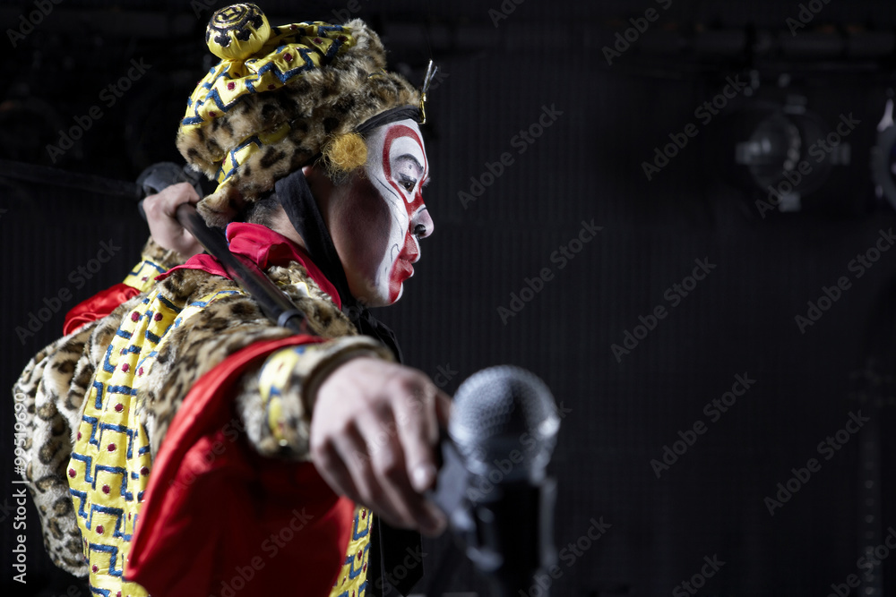 Fototapeta premium Man In Ceremonial Costume With Microphone