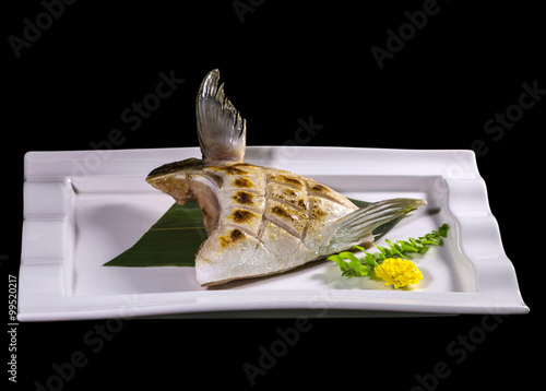 Buri Kama shioyaki teriyaki , fish grill on white plate photo