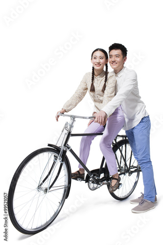 Young couple and bicycle in 1970s