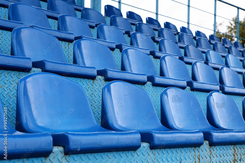 Fototapeta premium blue seats at stadium