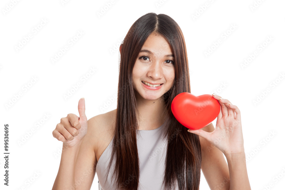 Beautiful young Asian woman thumbs up with red heart Beautiful young Asian woman thumbs up with red heart