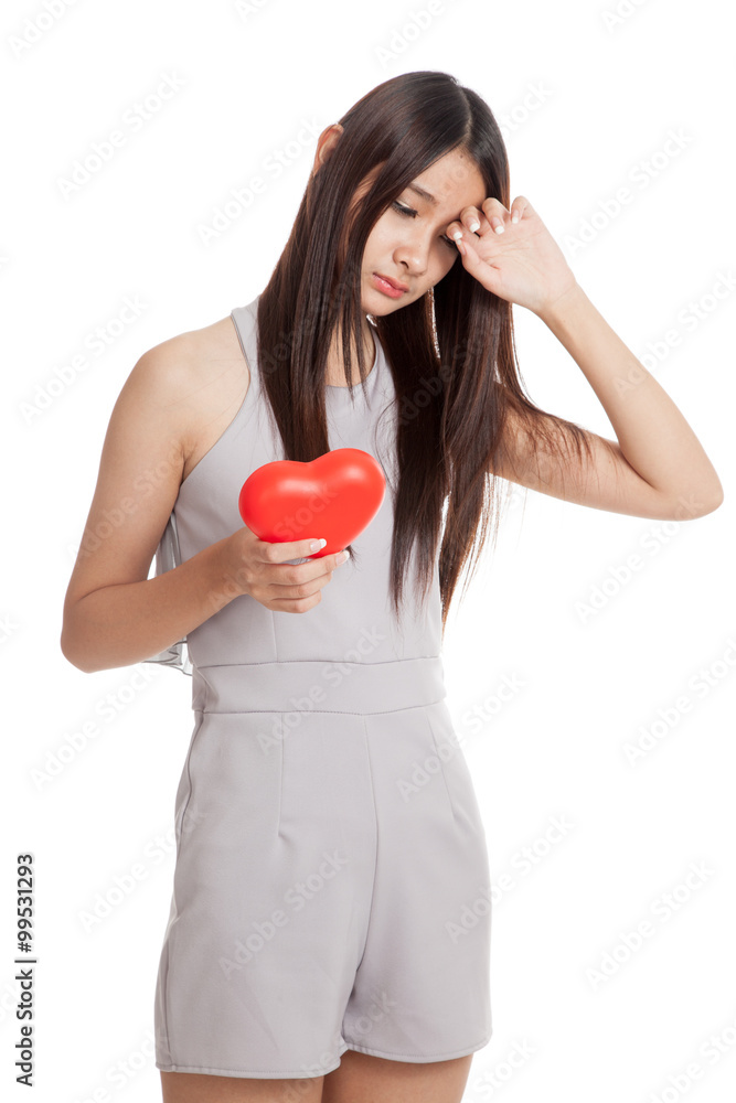 Beautiful young Asian woman with red heart Beautiful young Asian woman with red heart
