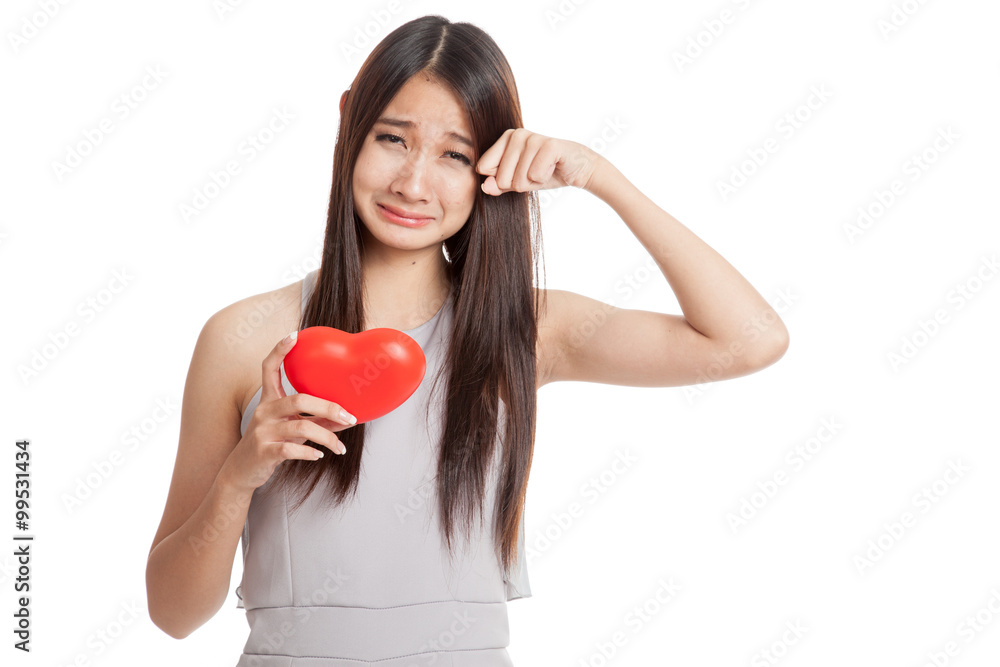 Beautiful young Asian woman cry with red heart Beautiful young Asian woman cry with red heart